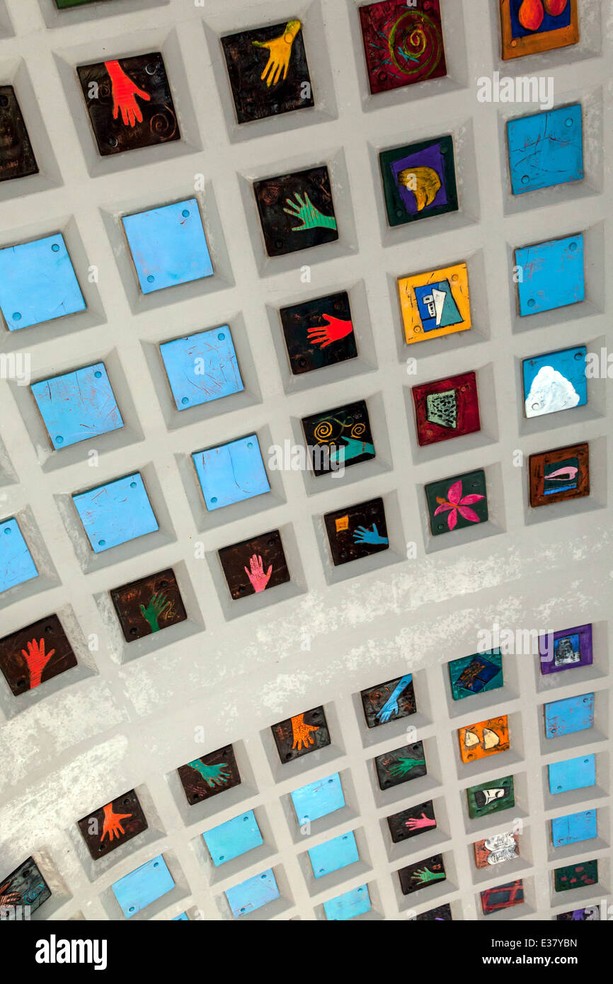 Colorful, handmade ceramic tiles adorn the coffered ceiling of the Miami Brickell Metrorail Station. Stock Photo