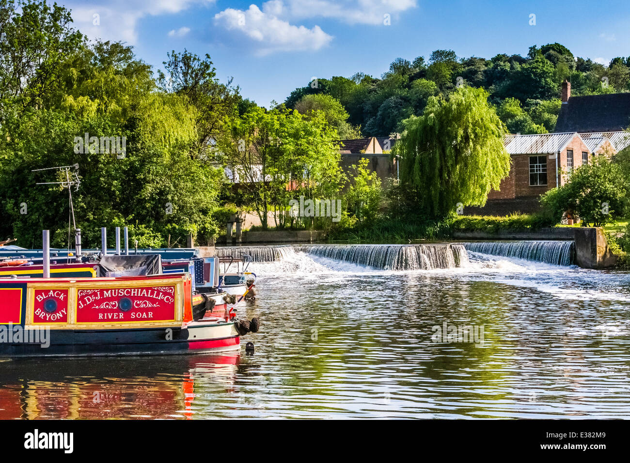 Canal boats below the Mountsorrel weir on the river soar Stock Photo