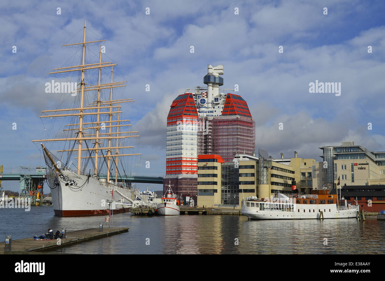 Gothenburg harbour overlooking the Lilla Bommen building and a tall ship Stock Photo