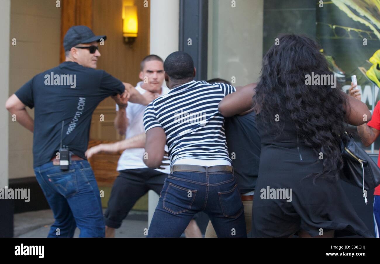 A altercation between a man and a group of people in Union Square turns nasty as two men trade punches. It is not clear what their grievance was about, but the scuffle was enough to prompt a passer-by to call the police to defuse the situation.  Where: Ne Stock Photo