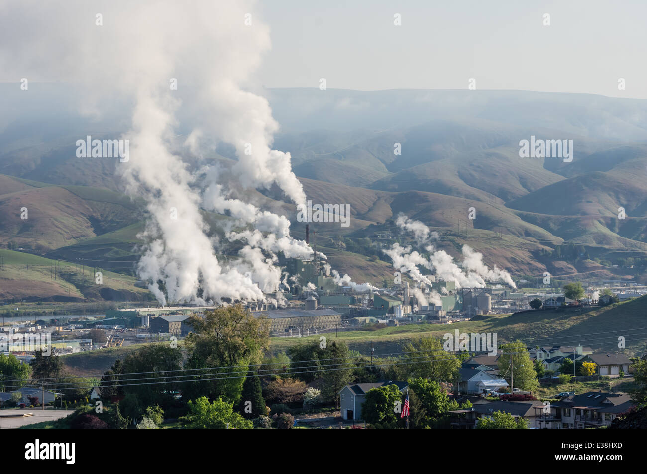 Air pollution from an industrial plant with smog Stock Photo