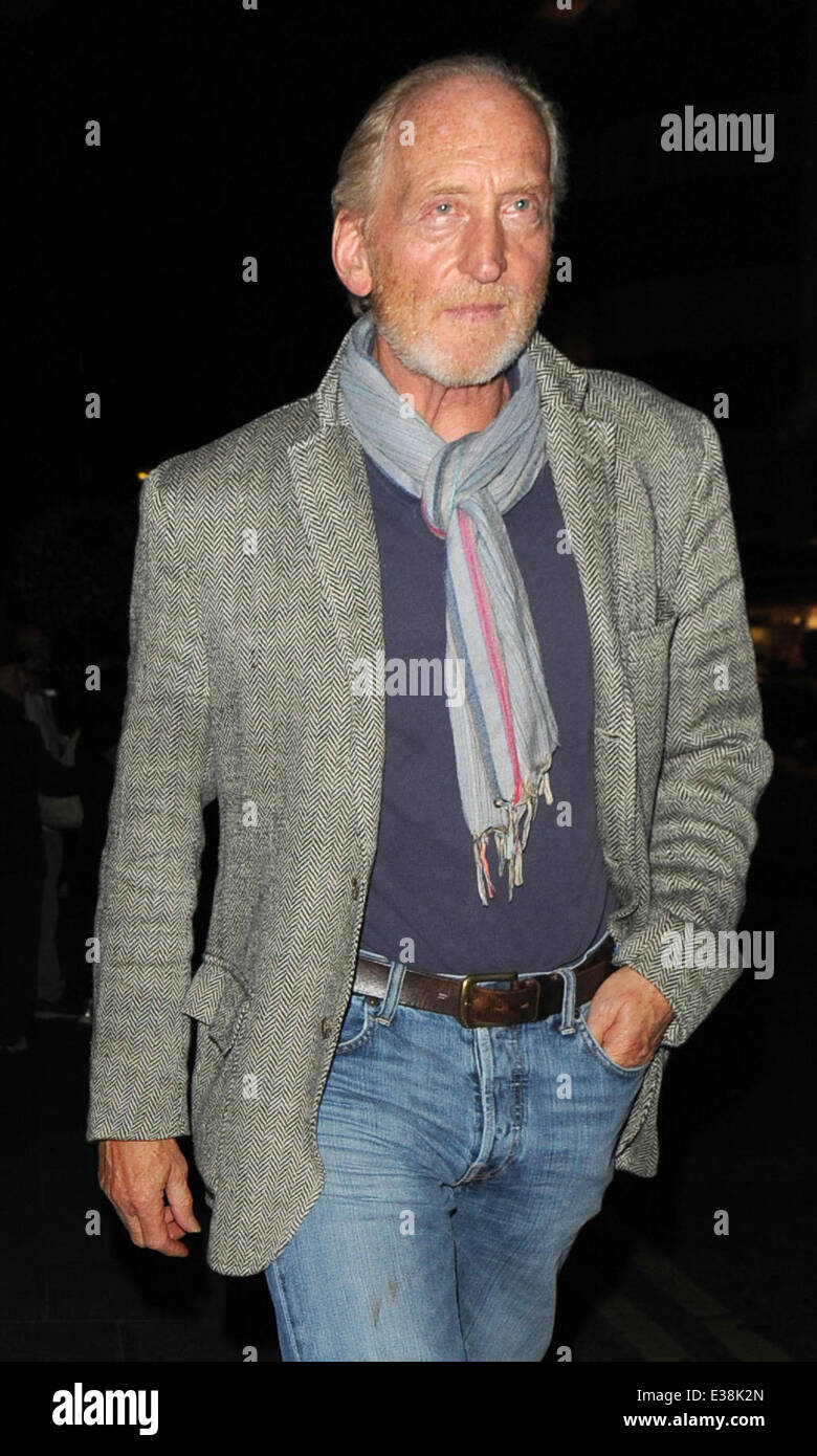 Charles Dance leaves The Groucho Club with a woman  Featuring: Charles Dance Where: London, United Kingdom When: 17 Aug 2013 Stock Photo