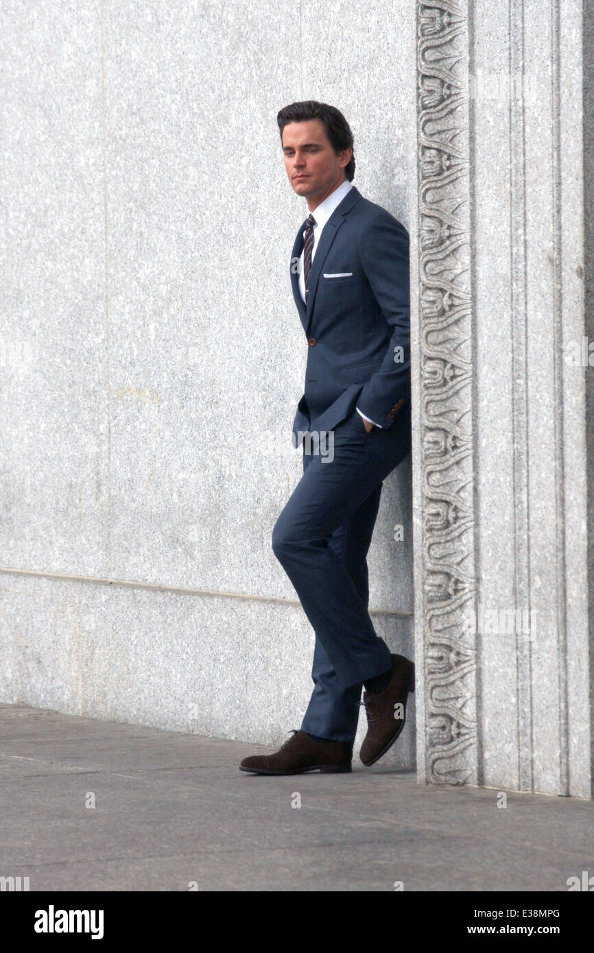 Matt Bomer looking sharp in a grey suit filming a scene for TV series 'White  Collar' Featuring: Matt Bomer Where: New York, NY, United States When: 19  Aug 2013 Stock Photo - Alamy