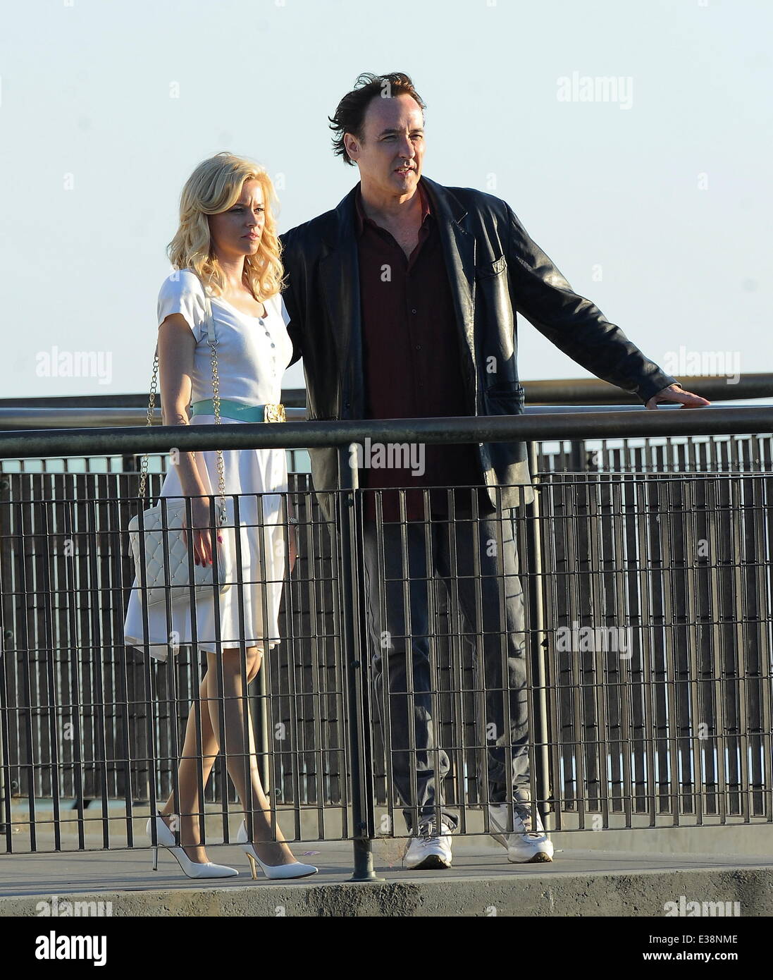 Actress Elizabeth Banks and her co star John Cusack watching the sunset