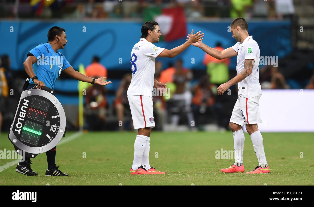 Manaus, Brazil. 22nd June, 2014. Clint Dempsey (R) of the USA is substituted by Chris Wondolowski during the the FIFA World Cup 2014 group G preliminary round match between the USA and Portugal at the Arena Amazonia Stadium in Manaus, Brazil, 22 June 2014. Photo: Marius Becker/dpa/Alamy Live News Stock Photo