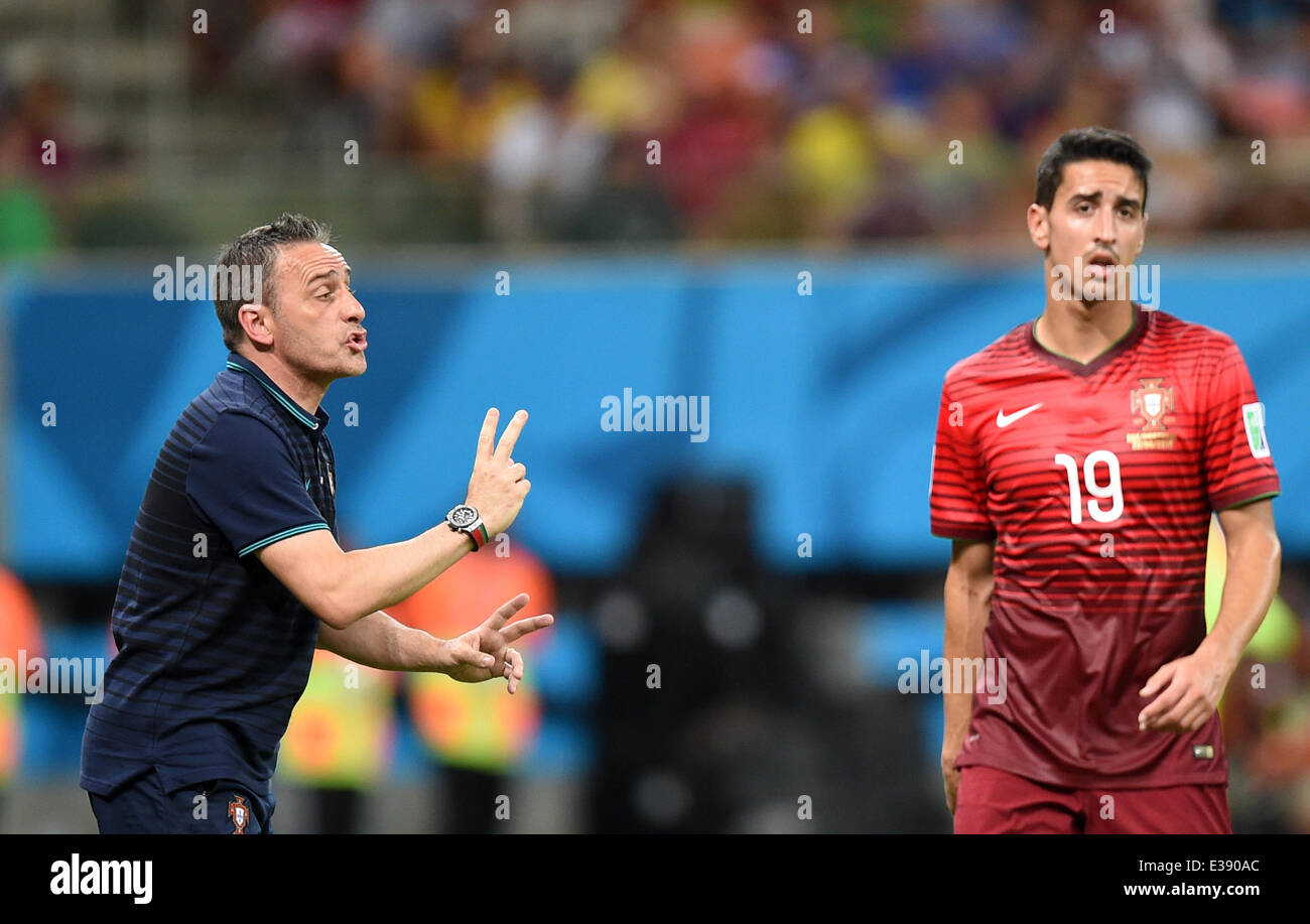 Manaus, Brazil. 22nd June, 2014. Head coach Paulo Bento of Portugal reacts next to Andre Almeida (R) during the FIFA World Cup 2014 group G preliminary round match between the USA and Portugal at the Arena Amazonia Stadium in Manaus, Brazil, 22 June 2014. Photo: Marius Becker/dpa/Alamy Live News Stock Photo