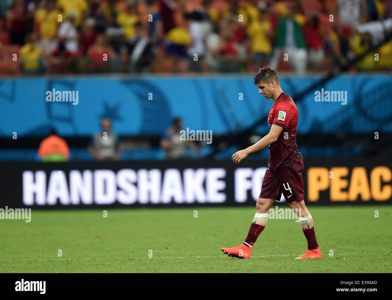 Manaus, Brazil. 22nd June, 2014. Miguel Veloso of Portugal reacts during the FIFA World Cup 2014 group G preliminary round match between the USA and Portugal at the Arena Amazonia Stadium in Manaus, Brazil, 22 June 2014. Photo: Marius Becker/dpa/Alamy Live News Stock Photo