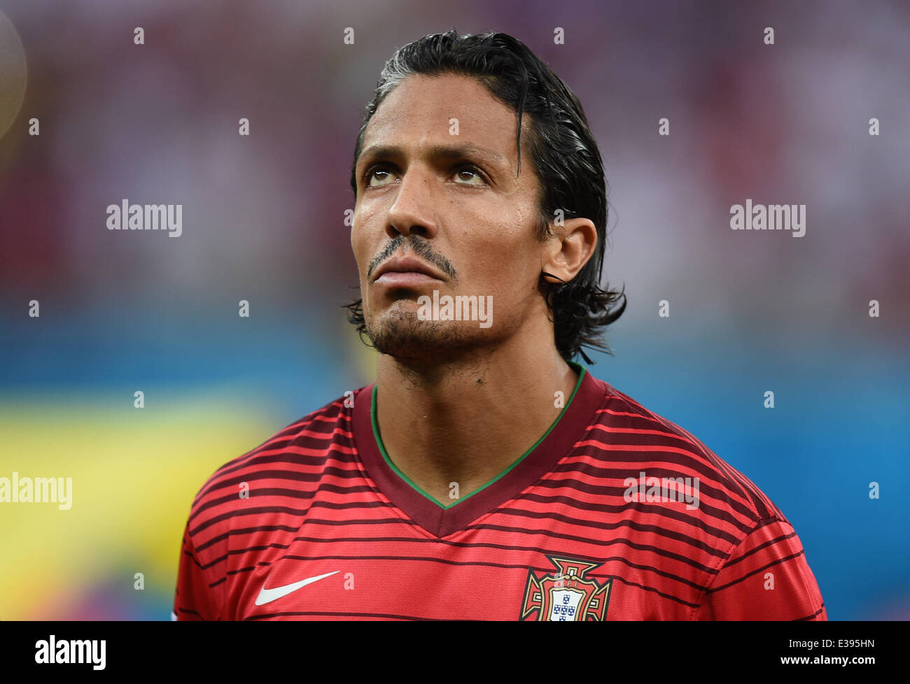 Manaus, Brazil. 22nd June, 2014. Bruno Alves of Ronaldo seen the national anthem prior to the FIFA World Cup 2014 group G preliminary round match between the USA and Portugal at the Arena Amazonia Stadium in Manaus, Brazil, 22 June 2014. Photo: Marius Becker/dpa/Alamy Live News Stock Photo