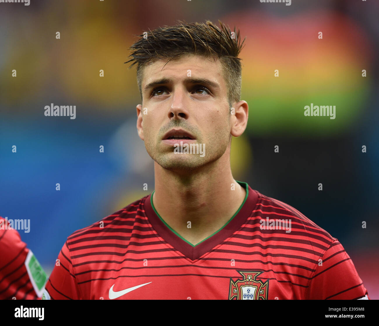 Manaus, Brazil. 22nd June, 2014. Miguel Veloso of Portugal seen during the national anthem prior to the FIFA World Cup 2014 group G preliminary round match between the USA and Portugal at the Arena Amazonia Stadium in Manaus, Brazil, 22 June 2014. Photo: Marius Becker/dpa/Alamy Live News Stock Photo