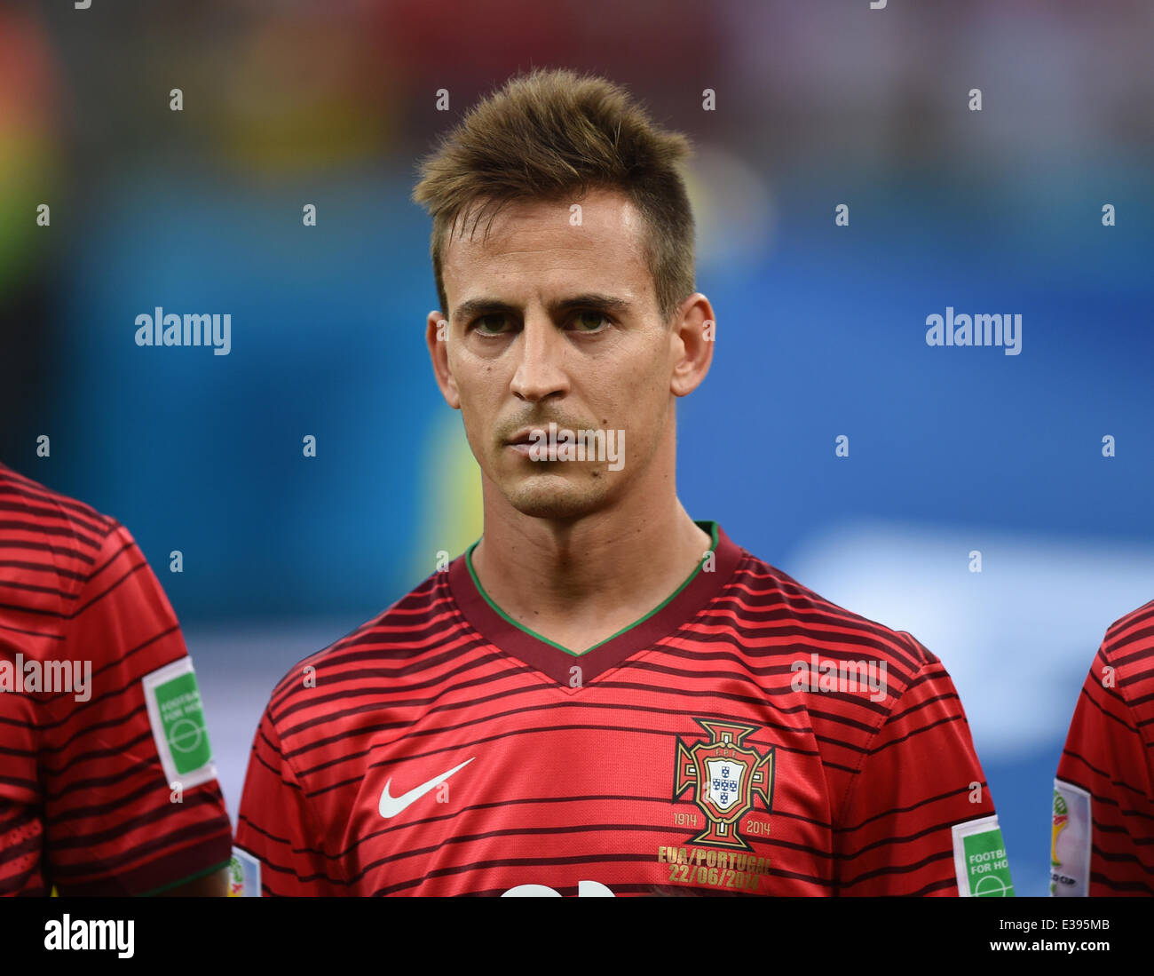Manaus, Brazil. 22nd June, 2014. Joao Pereira of Portugal seen the national anthem prior to the FIFA World Cup 2014 group G preliminary round match between the USA and Portugal at the Arena Amazonia Stadium in Manaus, Brazil, 22 June 2014. Photo: Marius Becker/dpa/Alamy Live News Stock Photo
