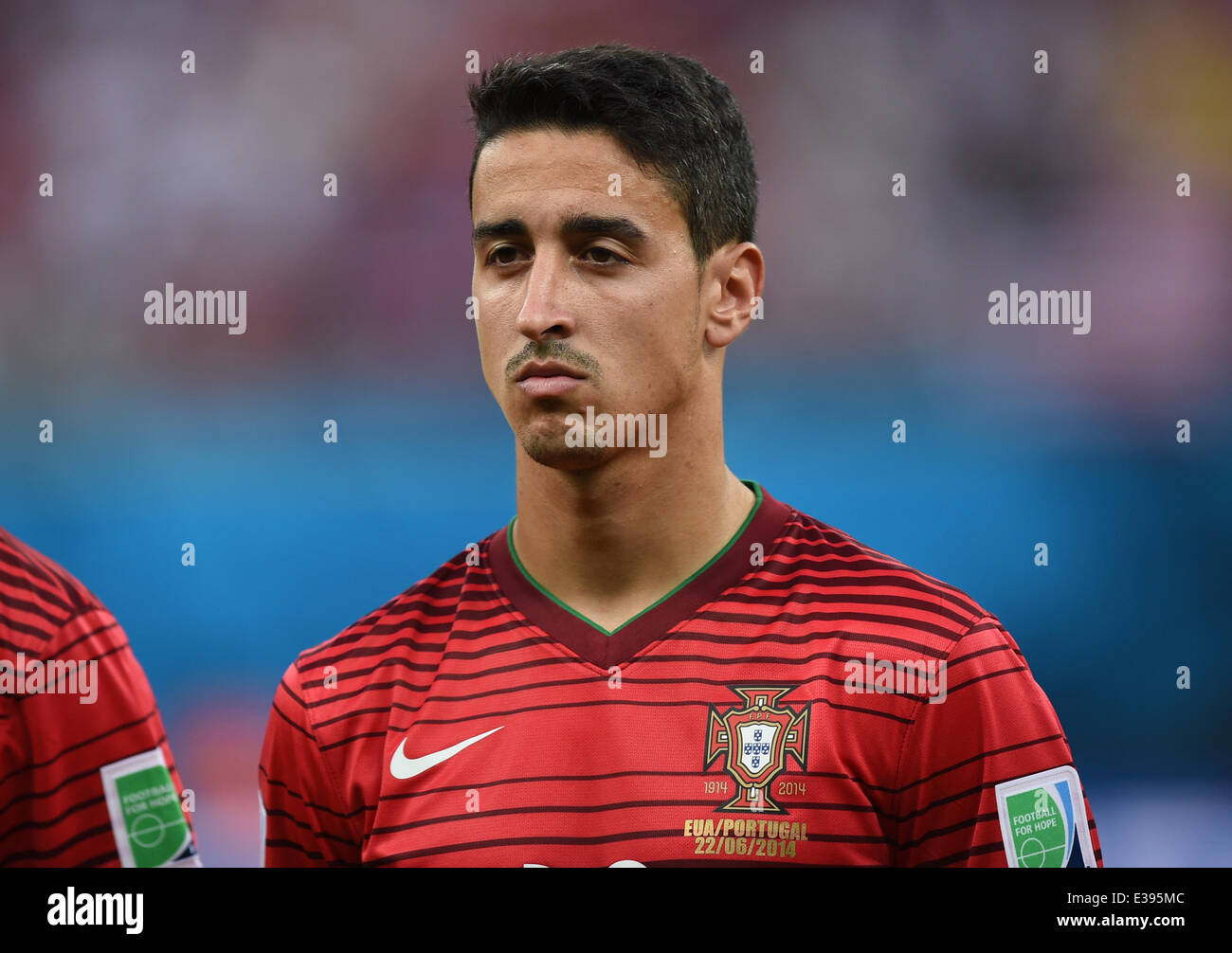Manaus, Brazil. 22nd June, 2014. Andre Almeida of Portugal seen the national anthem prior to the FIFA World Cup 2014 group G preliminary round match between the USA and Portugal at the Arena Amazonia Stadium in Manaus, Brazil, 22 June 2014. Photo: Marius Becker/dpa/Alamy Live News Stock Photo