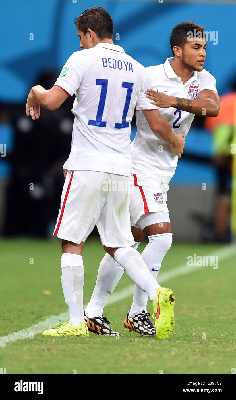 Manaus, Brazil. 22nd June, 2014. Alejandro Bedoya (L) of the USA is substituted by DeAndre Yedlin during the the FIFA World Cup 2014 group G preliminary round match between the USA and Portugal at the Arena Amazonia Stadium in Manaus, Brazil, 22 June 2014. Photo: Marius Becker/dpa/Alamy Live News Stock Photo