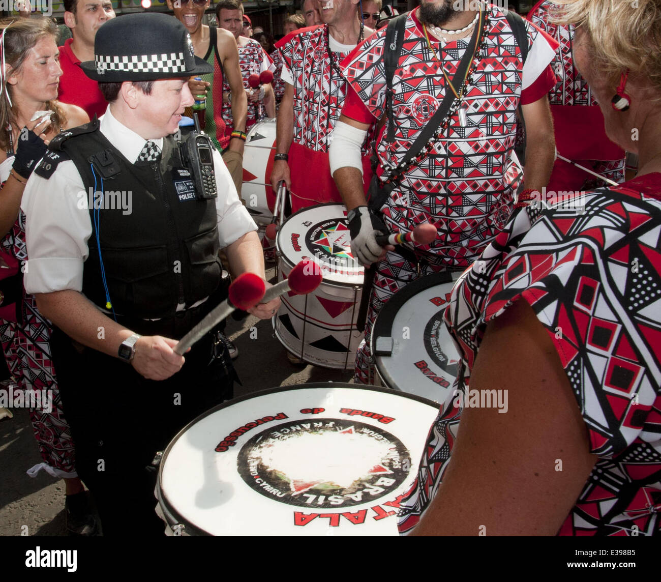 A Metropolitan police officer plays some steel drums during the 2013