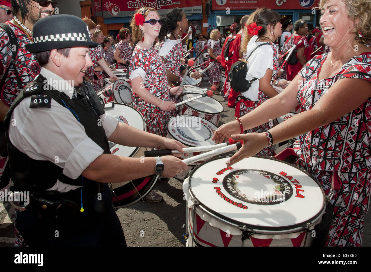 A Metropolitan police officer plays some steel drums during the 2013