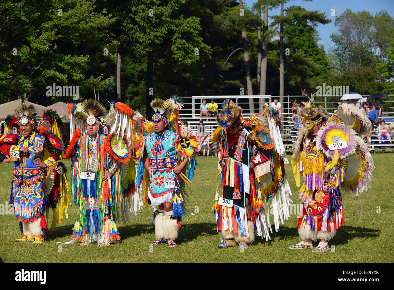 Ottawa, Canada. June 22st, 2014. Native men stand before judges after performing traditional dance in Summer Solstice Aboriginal Arts Festival for Aboriginal Day in Massey Park June 22, 2014 in Ottawa, Canada Credit:  Paul McKinnon/Alamy Live News Stock Photo