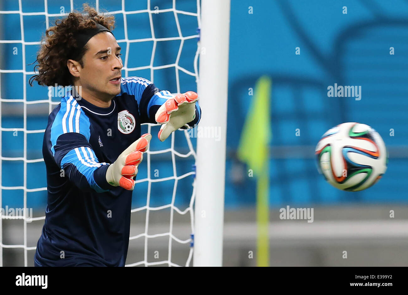 Recife, Brazil. 22nd June, 2014. Guillermo Ochoa, goalie of the Mexican national soccer team, takes part in a training session at the Arena Pernambuco, in Recife, Brazil, on June 22, 2014. Credit:  AGENCIA ESTADO/Xinhua/Alamy Live News Stock Photo