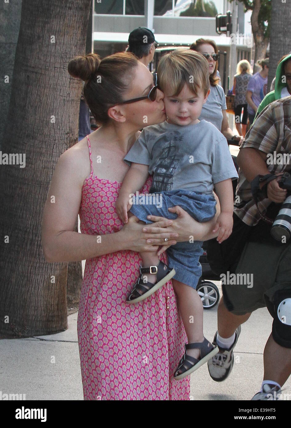 Actress Alyssa Milano out with husband, David Bugliari and son Milo Bugliari  celebrating his second Birthday at the Farmers Market Featuring: Alyssa  Milano When: 01 Sep 2013 Stock Photo - Alamy