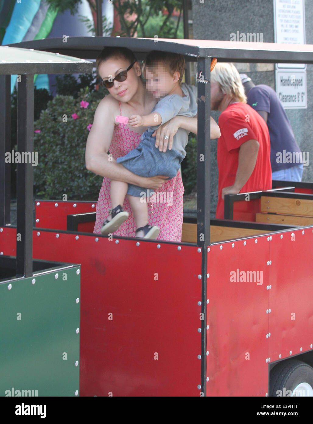 Actress Alyssa Milano out with husband, David Bugliari and son Milo