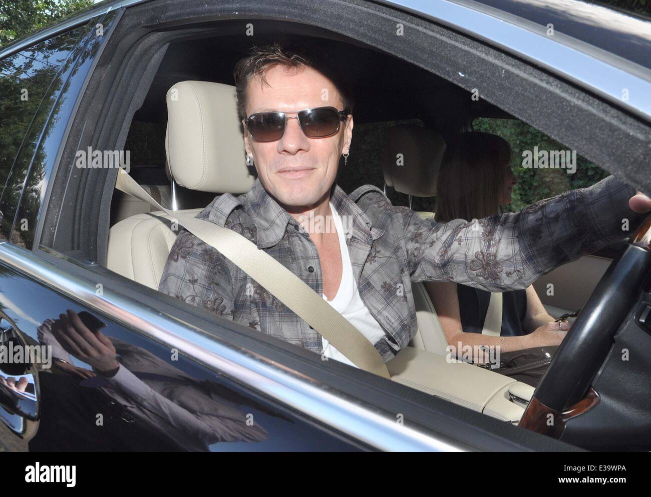 Guests including U2 manager Paul McGuinness, Drummer Larry Mullen and The Edge seen leaving the home of U2 Bassist Adam Clayton after a wedding reception lunch at the house. Noticeable absence was Bono, but his wife Ali Hewson attended, Adam Clayton later Stock Photo