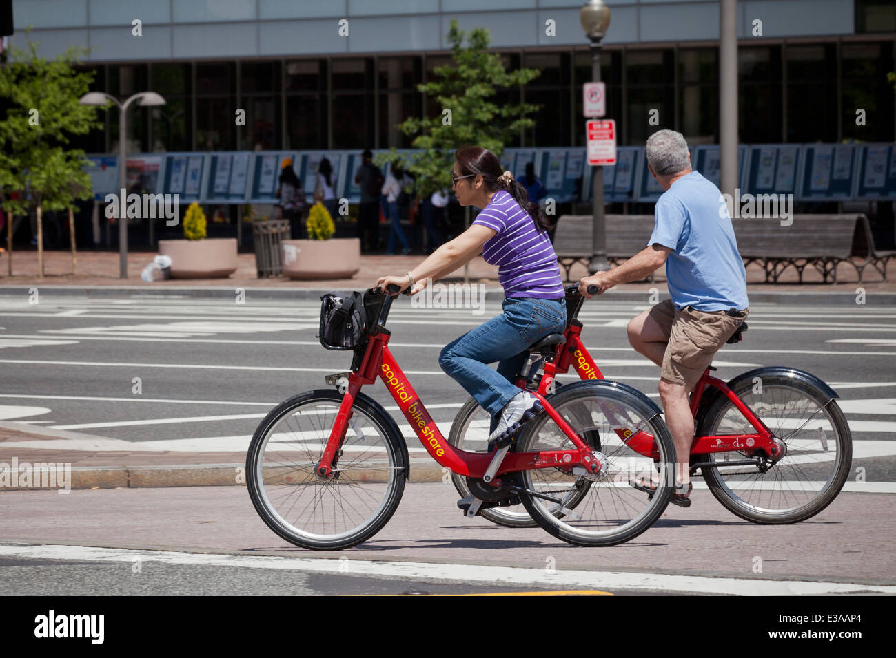 People riding on Capital Bikeshare bikes Washington, DC USA Stock
