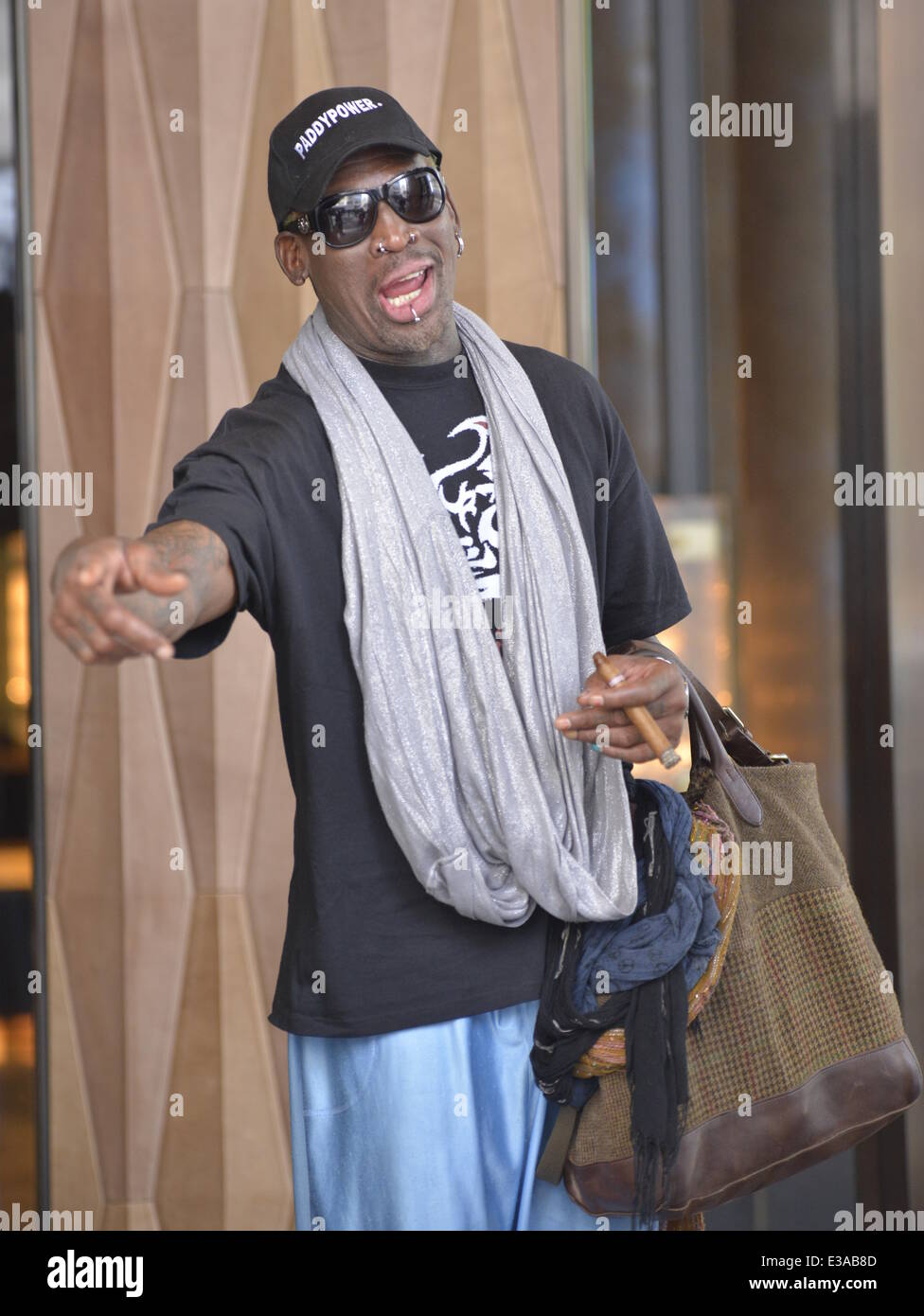 Former US basketball star Dennis Rodman returns home after a trip to