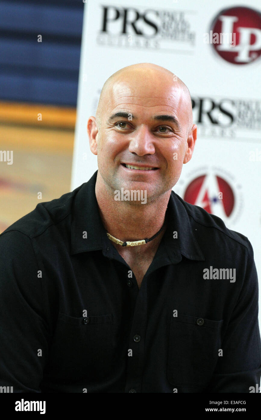 ANDRE AGASSI Joins CARLOS SANTANA For Musical Instrument Donation At