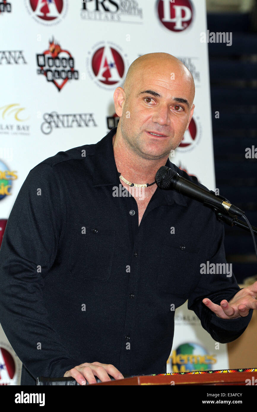ANDRE AGASSI Joins CARLOS SANTANA For Musical Instrument Donation At