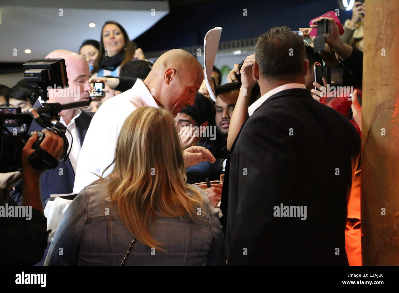 Dwayne Johnson (The Rock) meets fans on the red carpet at the Hercules  screening at Event Cinema, George Street, Sydney Stock Photo - Alamy