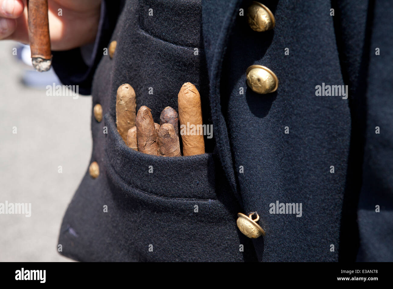 Hand rolled cigars in man's pocket - USA Stock Photo