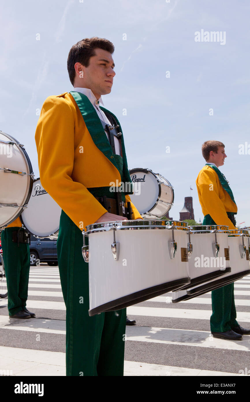 High school marching band percussion section in parade USA Stock