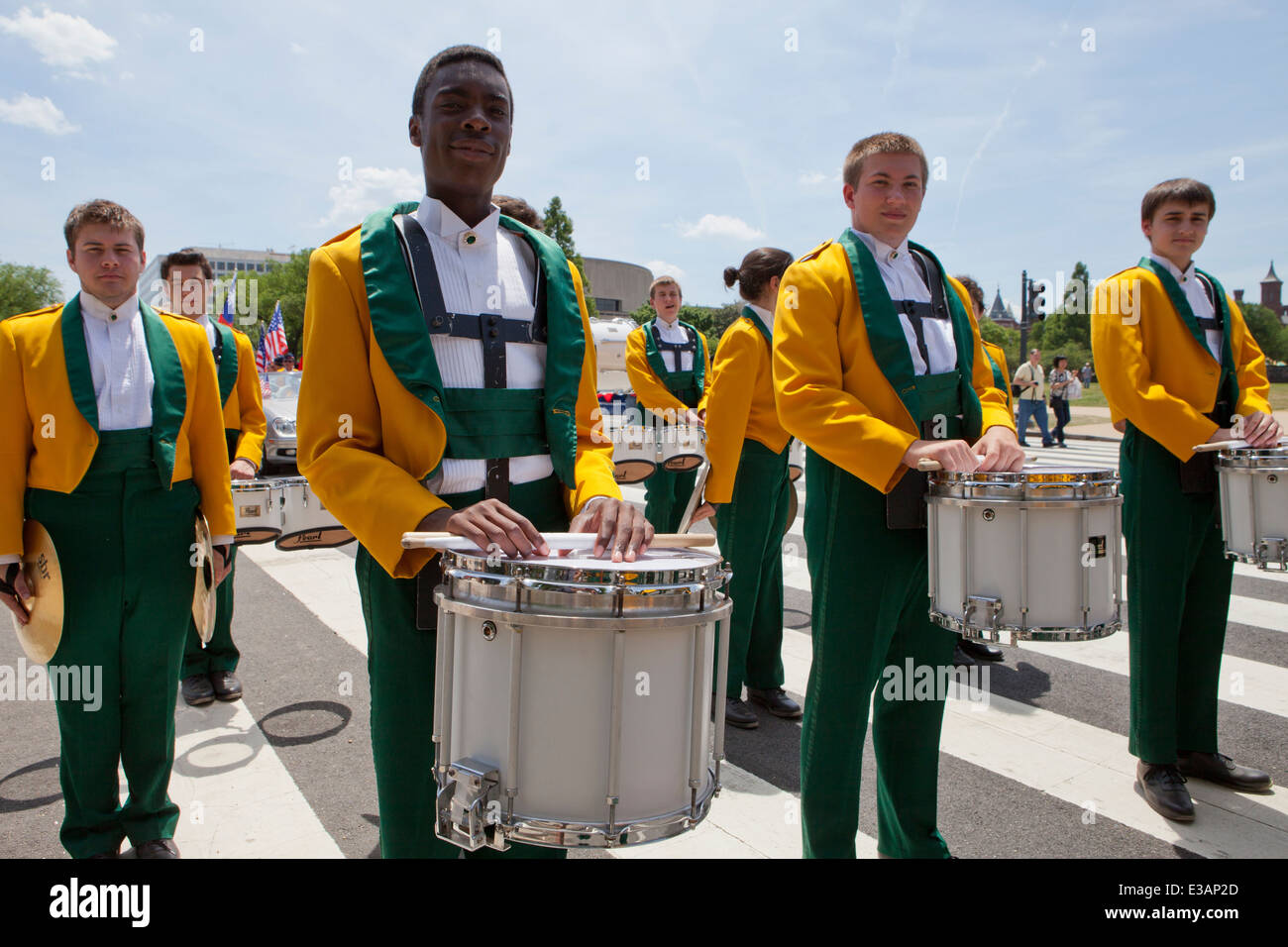 High school marching band percussion section in parade - USA Stock Photo