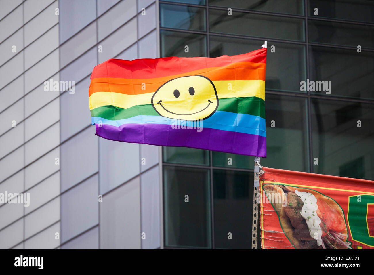 Smiley face on rainbow flag Stock Photo