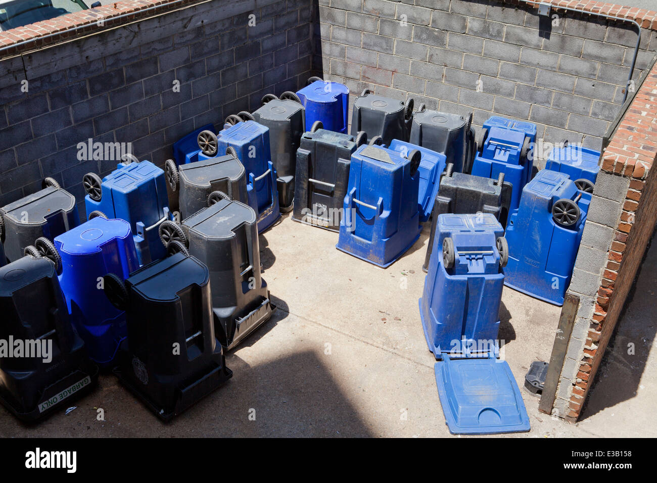 Upturned blue recycle wheelie bins USA Stock Photo Alamy