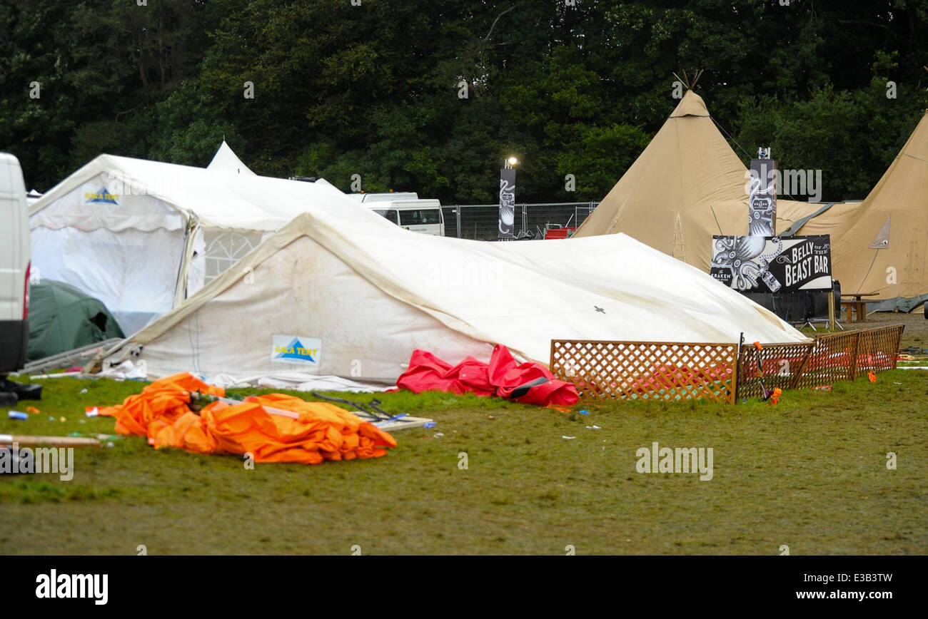 Due to further winds forecast for the United Kingdom. Workmen re-enforce the arena tents at the Festival Number 6.  Where: Portmeirion, Wales When: 15 Sep 2013 Stock Photo