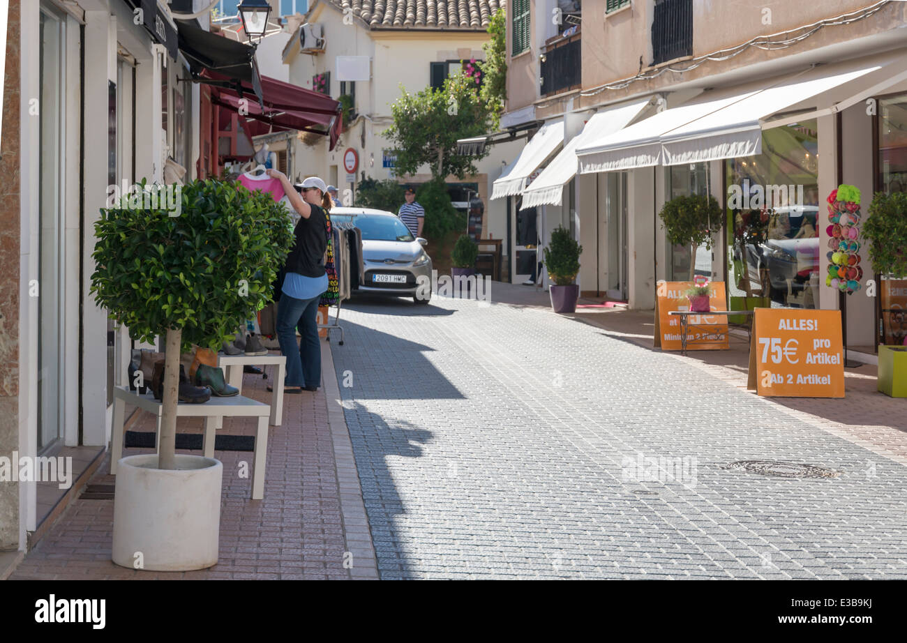 Street view in Port d'Andratx. Low season sales for German tourists. Mallorca, Balearic islands, Spain. Stock Photo