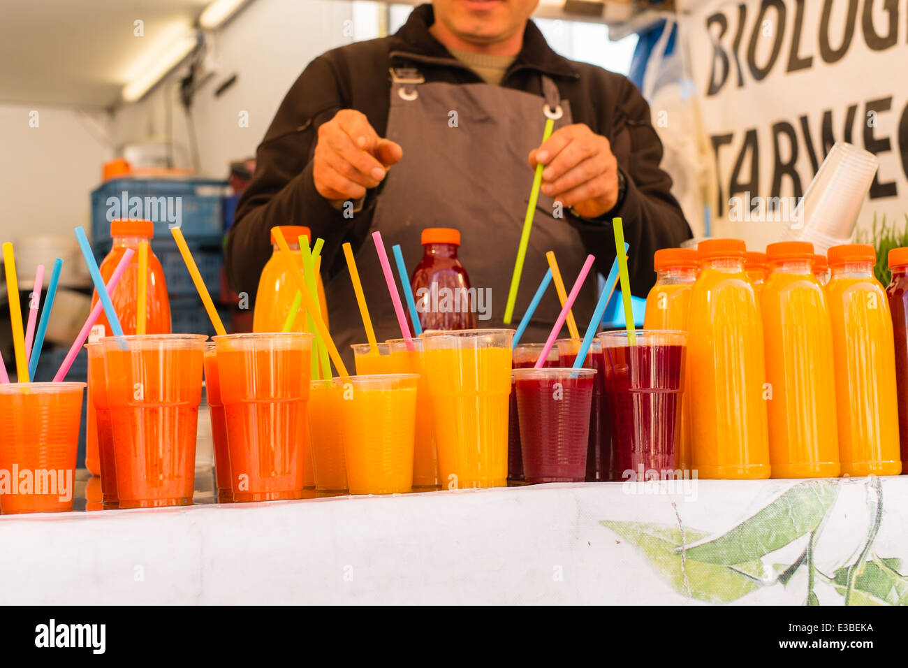 Fruit juices on sale at Nieuwmarkt organic market, Amstadam Stock Photo Alamy
