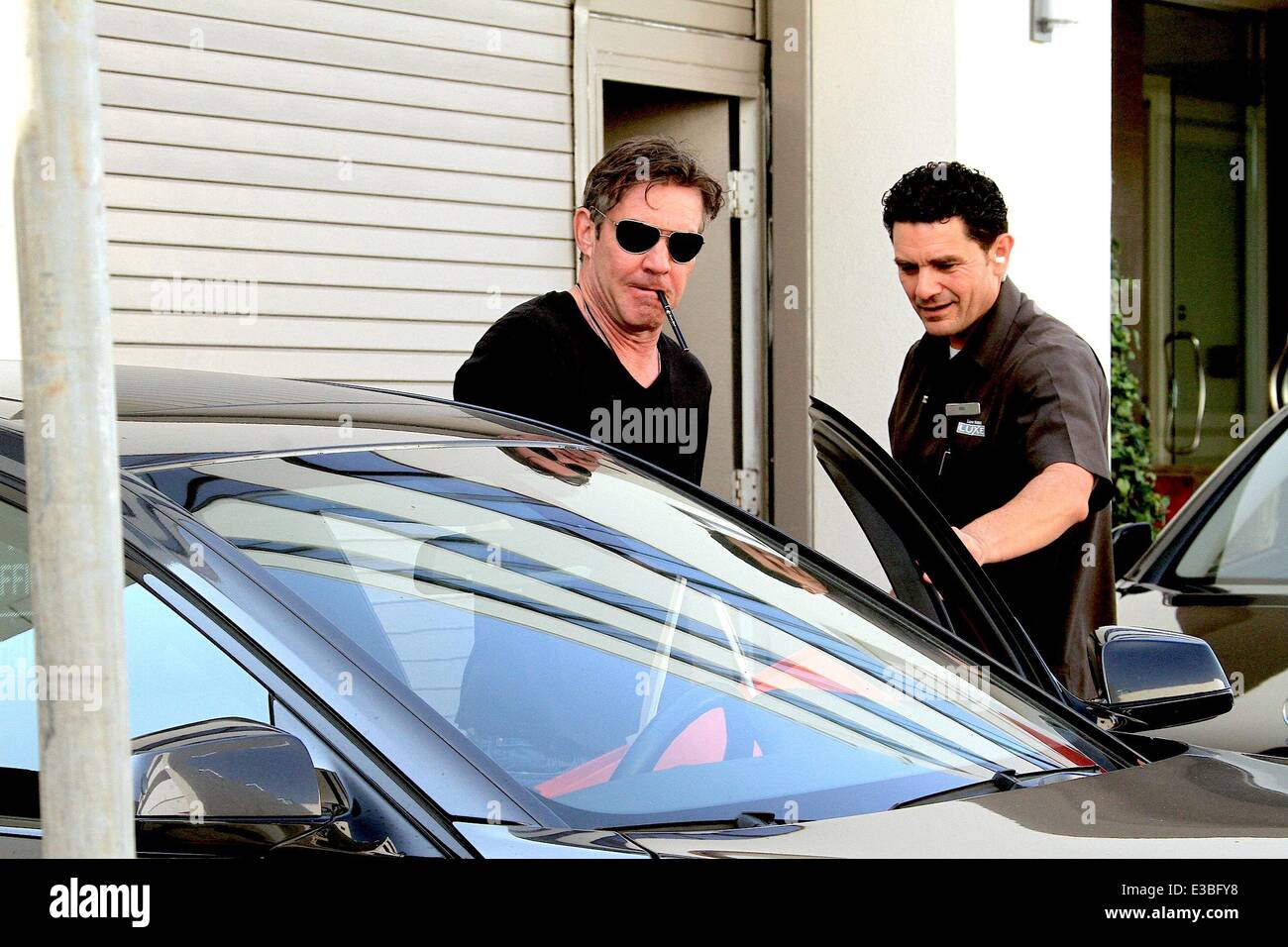 Dennis Quaid leaving The Luxe Hotel in Beverly Hills smoking a 'Smoke Stik'  e-cigarette Featuring: Dennis Quaid Where: Los Angeles, CA, United States  When: 19 Sep 2013 Stock Photo