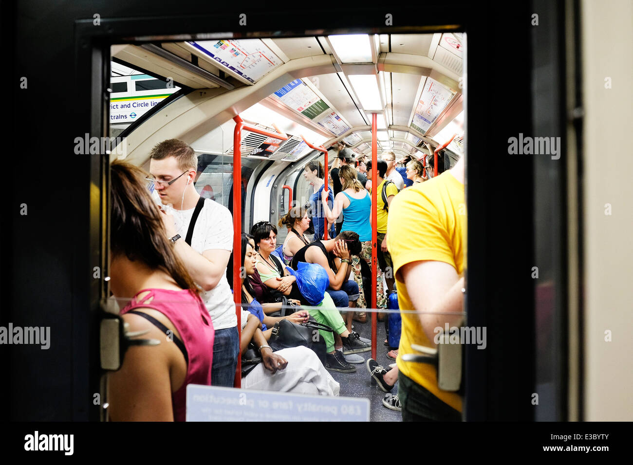 People travelling on the London Undergound system. Stock Photo