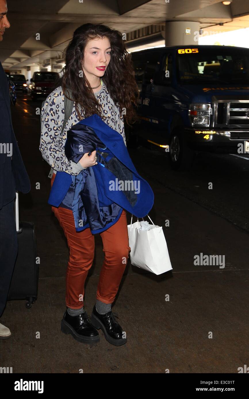 Ella Yelich-O'Connor, known by her stage name Lorde, arrive at LAX  Featuring: Lorde Where: Los Angeles, CA, United States When: 24 Sep 2013om Stock Photo