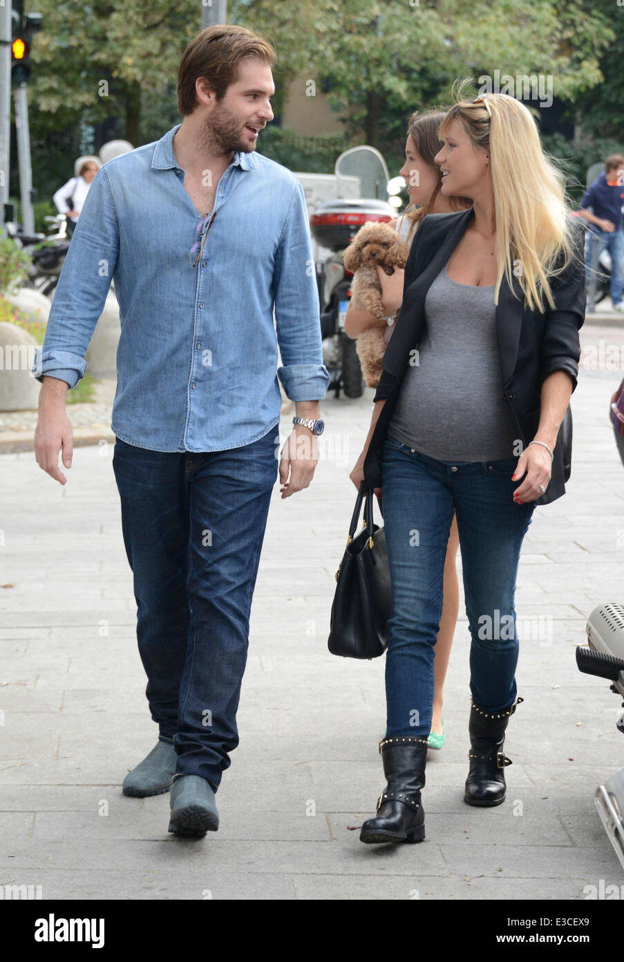 Pregnant Michelle Hunziker goes shopping with Tomaso Trussardi and her  daughter Aurora in Milan Featuring: Michelle Hunziker,Tomaso Trussardi  Where: Milan, Italy When: 29 Sep 2013 **** Stock Photo - Alamy