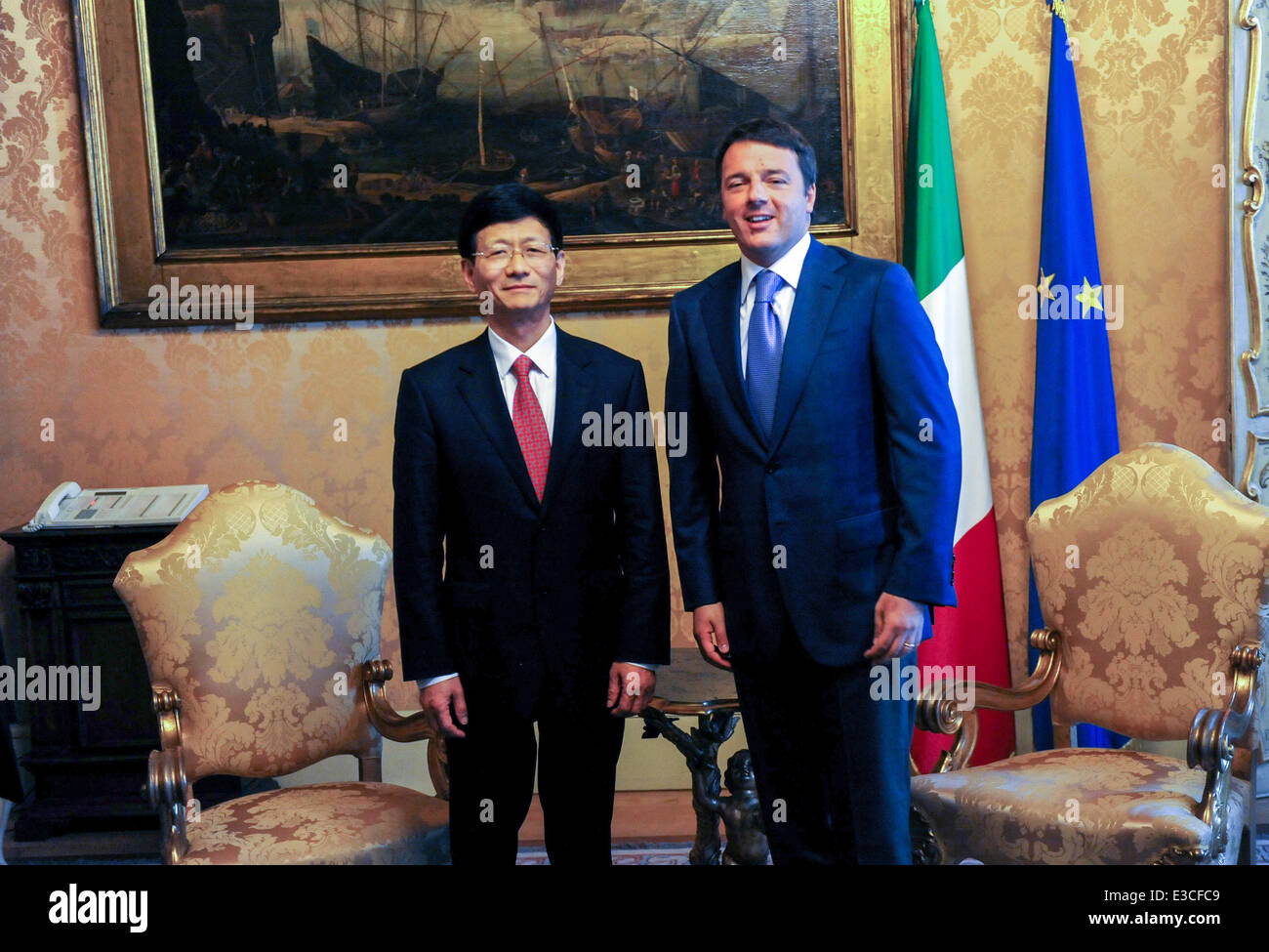 (140623) -- ROME, June 23, 2014 (Xinhua) -- Meng Jianzhu (L), head of the Commission for Political and Legal Affairs of the Communist Party of China (CPC) Central Committee and a member of the Political Bureau of the CPC Central Committee, meets with Italian Prime Minister Matteo Renzi in Rome, Italy, June 23, 2014. (Xinhua/Xu Nizhi) (srb) Stock Photo