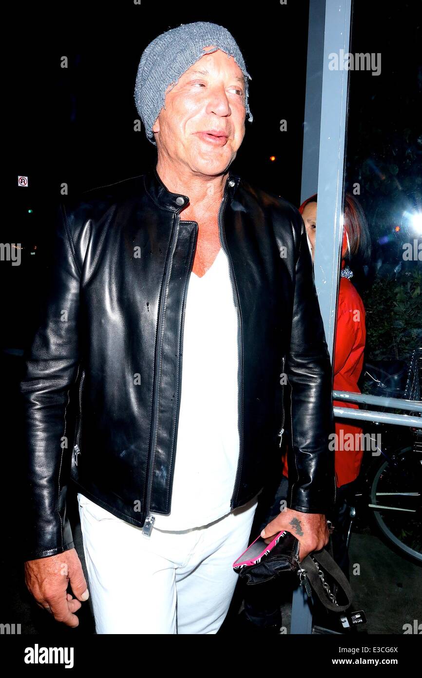 Mike Rourke Hat Micky Rourke wearing white trousers, black leather jacket and a tatty ...