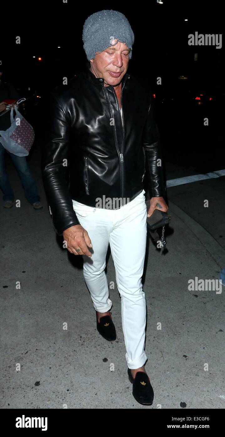 Mike Rourke Hat Micky Rourke wearing white trousers, black leather jacket and a tatty ...