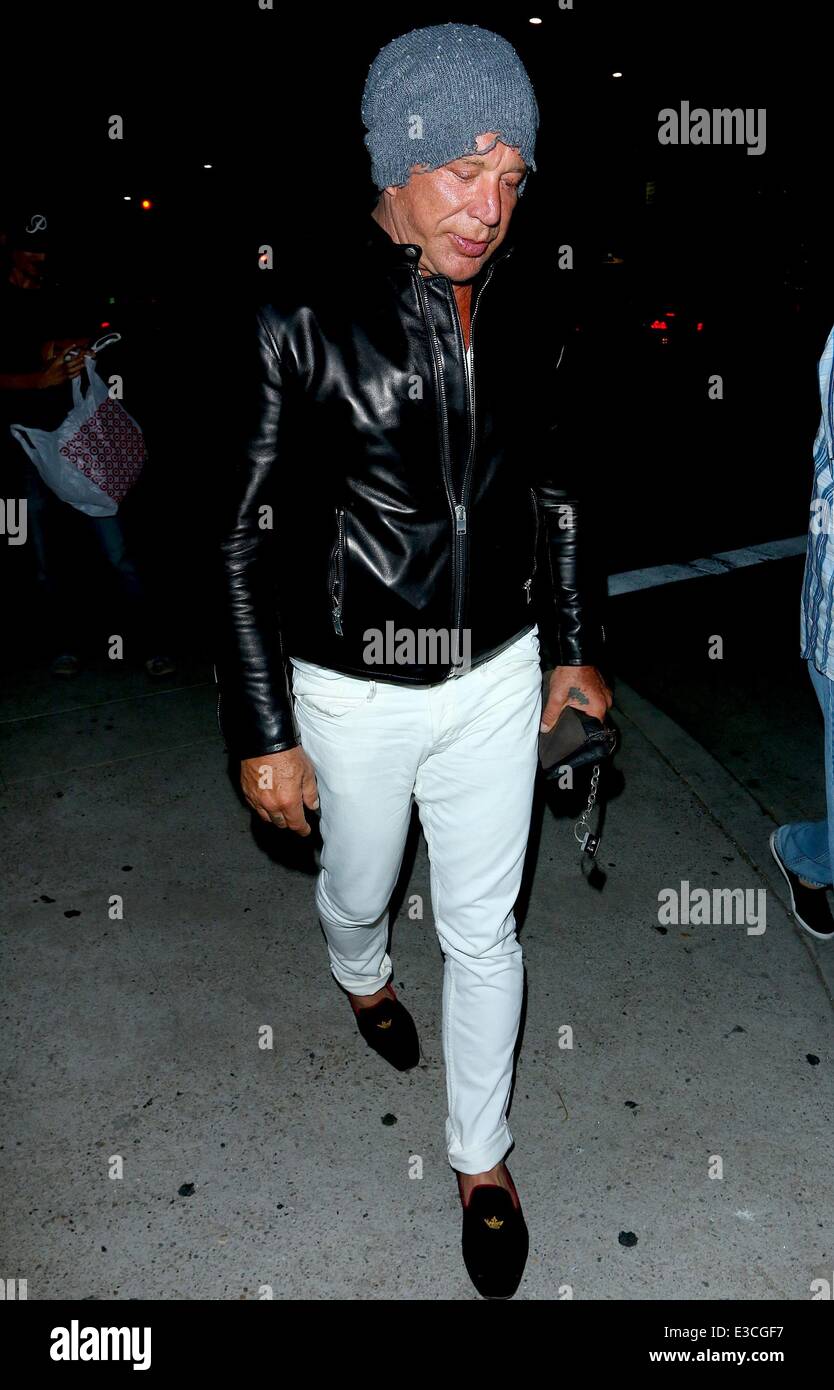 Mike Rourke Hat Micky Rourke wearing white trousers, black leather jacket and a tatty ...