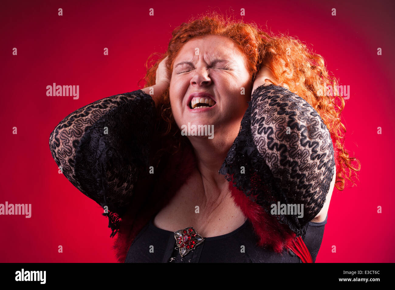 woman pulling her hair Stock Photo