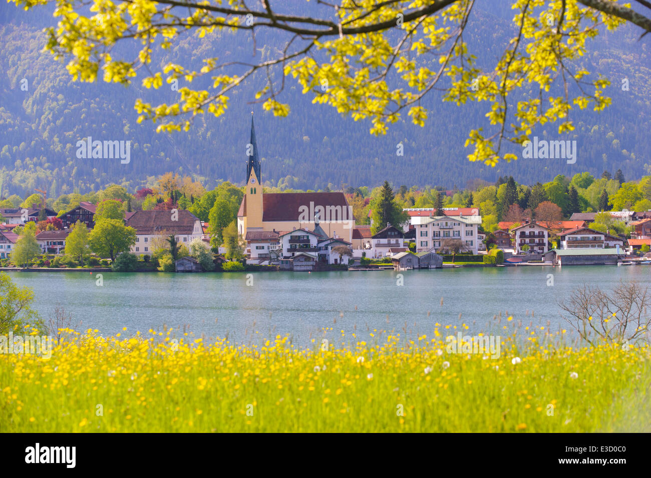 panorama landscape of lake Tegernsee in Bavaria at city Rottach-Egern and its church Stock Photo