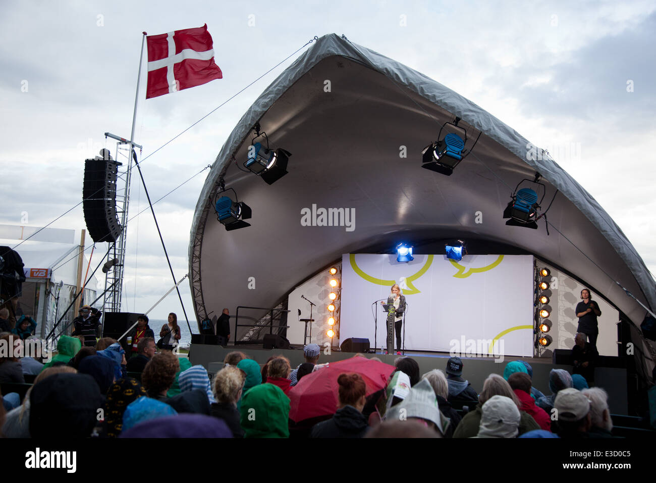 Folkemøde på Bornholm. Johanne Schmidt-Nielsen, leder af Enhedslisten taler på den store scene. Stock Photo