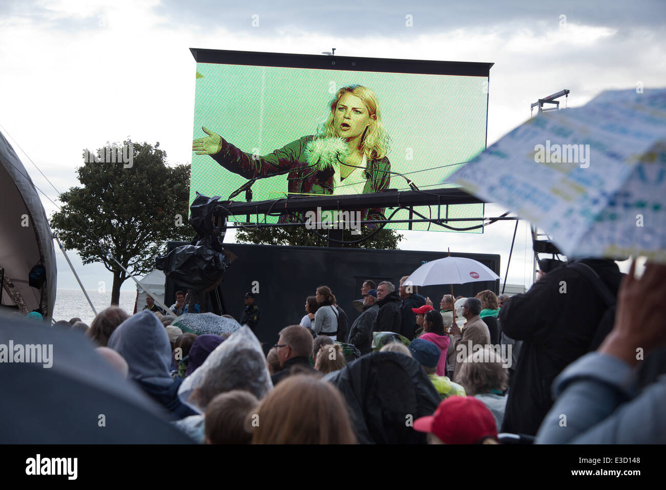 Folkemøde på Bornholm. Johanne Schmidt-Nielsen, leder af Enhedslisten taler på den store scene. Stock Photo