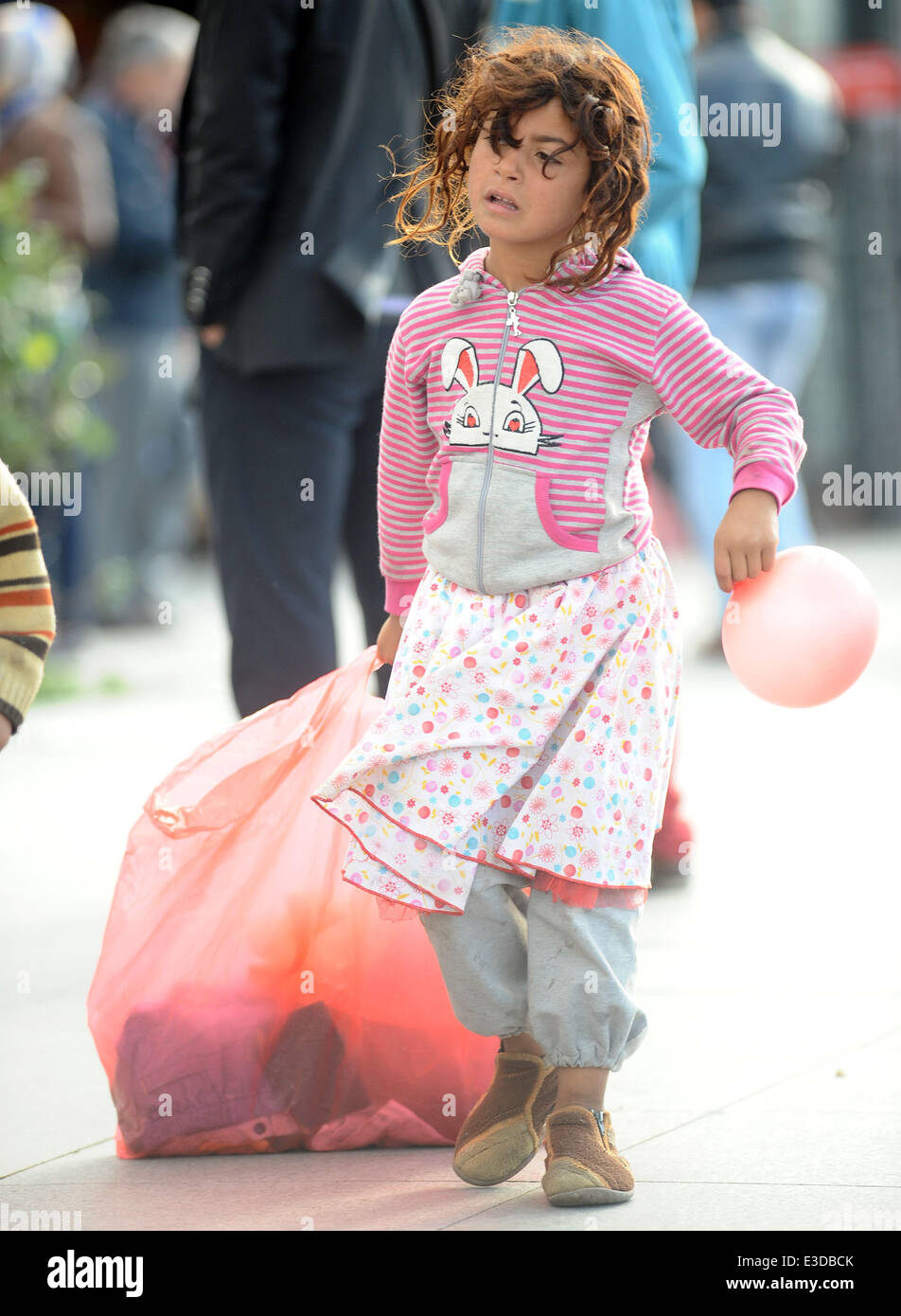 Syrian citizens have fled from Aleppo amid war to Turkey, many with small children, in search of a safe haven. According to reports, hundreds are now living in the parks and streets, mainly in the Kumkapı, Fatih and Sirinevler districts of the city, where they have been spotted begging for food for their families  Where: Istanbul, Turkey When: 07 Oct 2013  **** Stock Photo