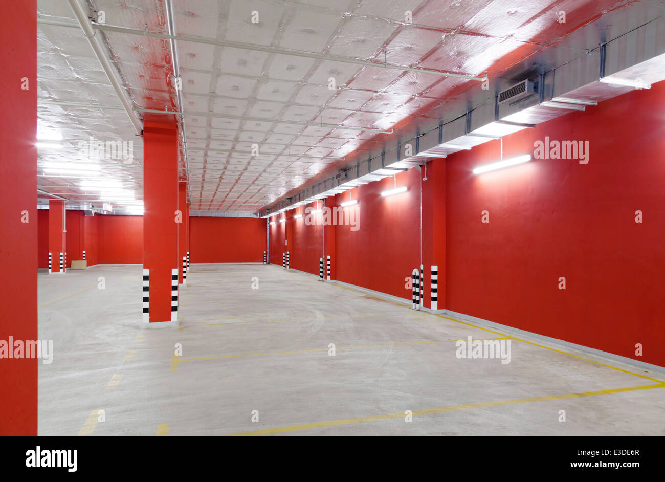 Empty parking area on long and beautiful underground garage Stock Photo